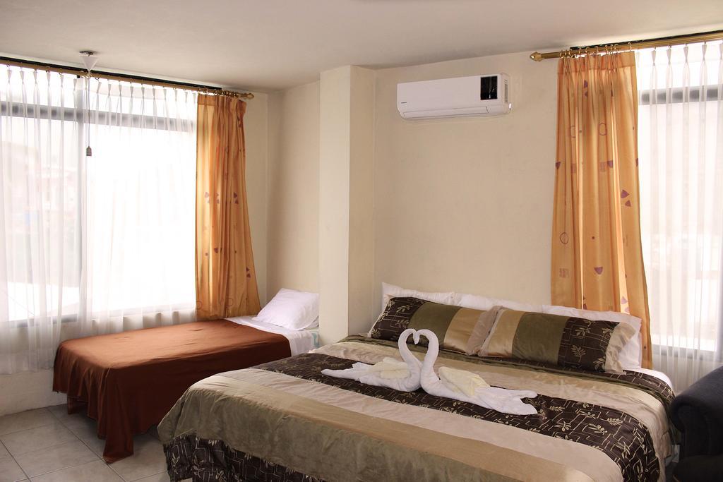 Planet House Hotel Puerto Ayora  Habitación foto